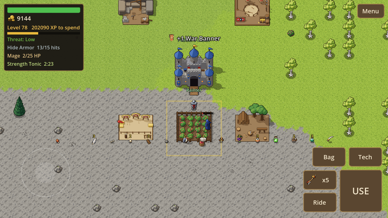 Primal Man: a player's castle with a berry field, archery range and woodlot around it